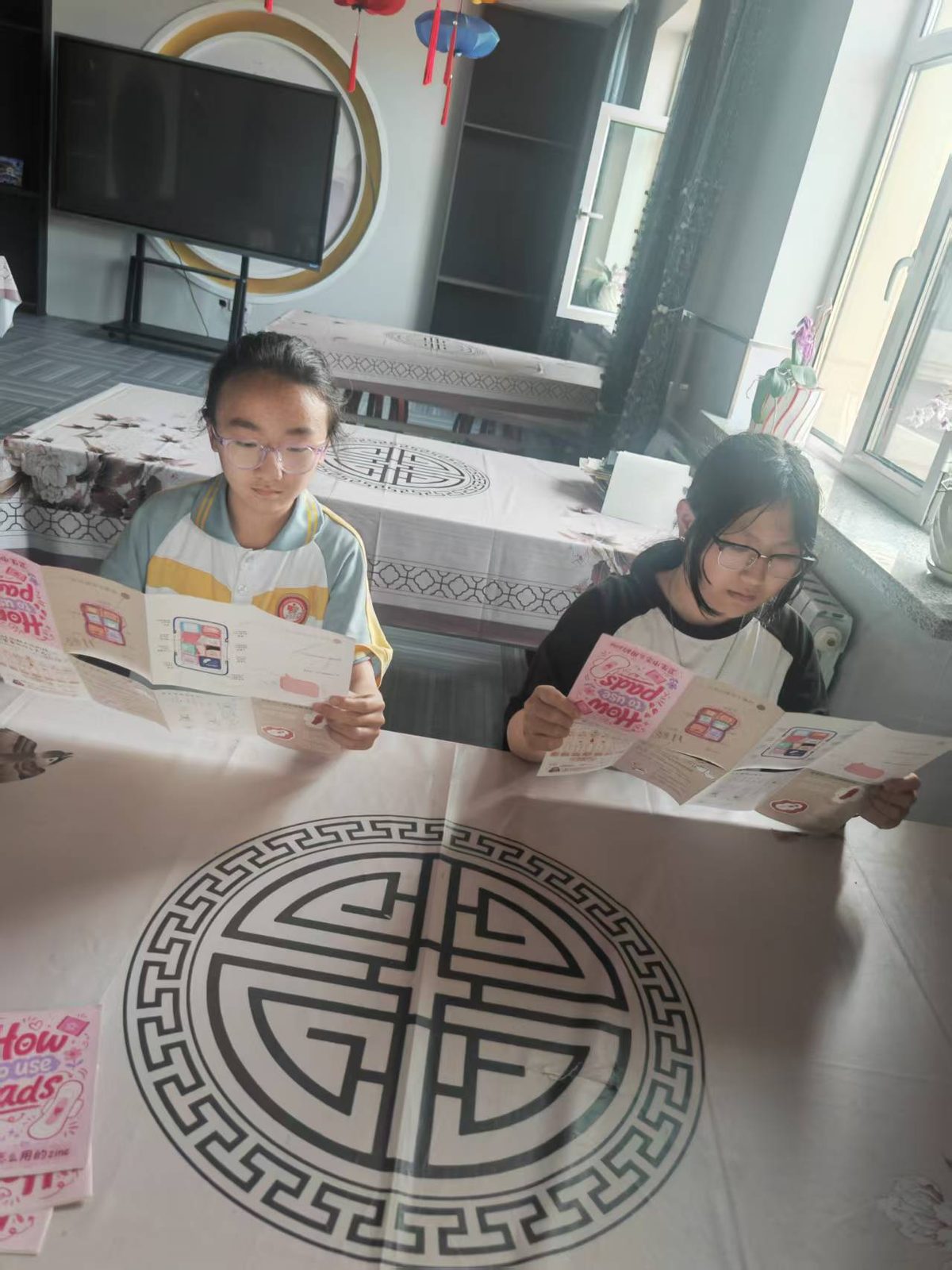 Students reading the zine in Lhasa, Tibet